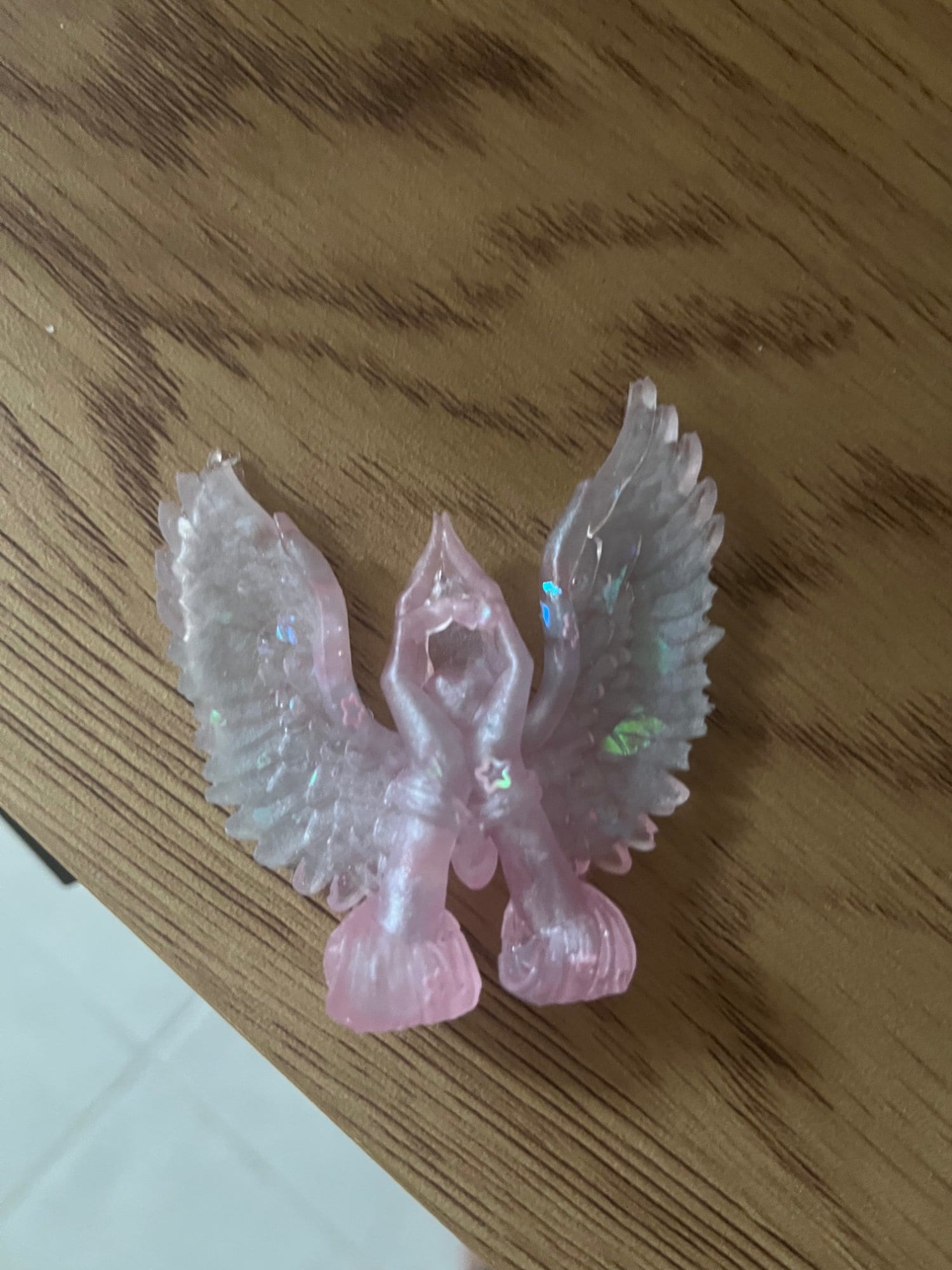 Hands Holding Heart with Wings Decoration